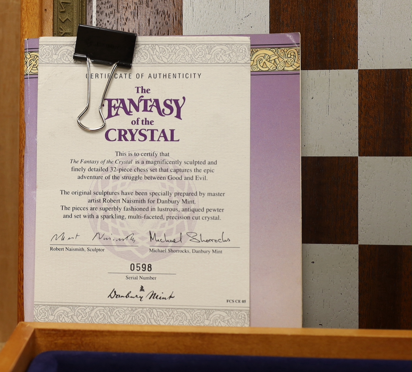 The Fantasy of the Crystal chess set and board with booklet and certificate of authenticity numbered 0598, the largest piece 8.5cm high